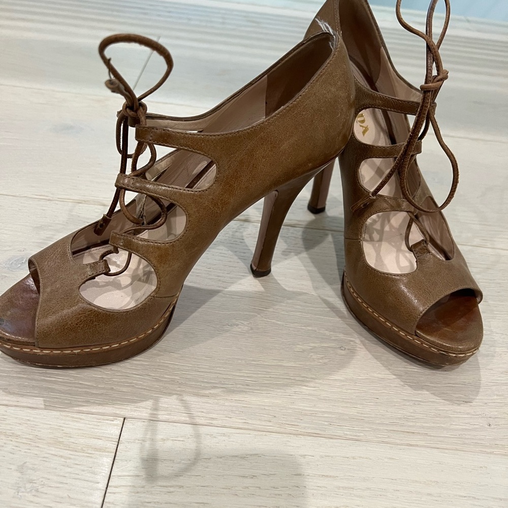 Prada. Taupe leather lace up platform heel. Great condition. Size 9.